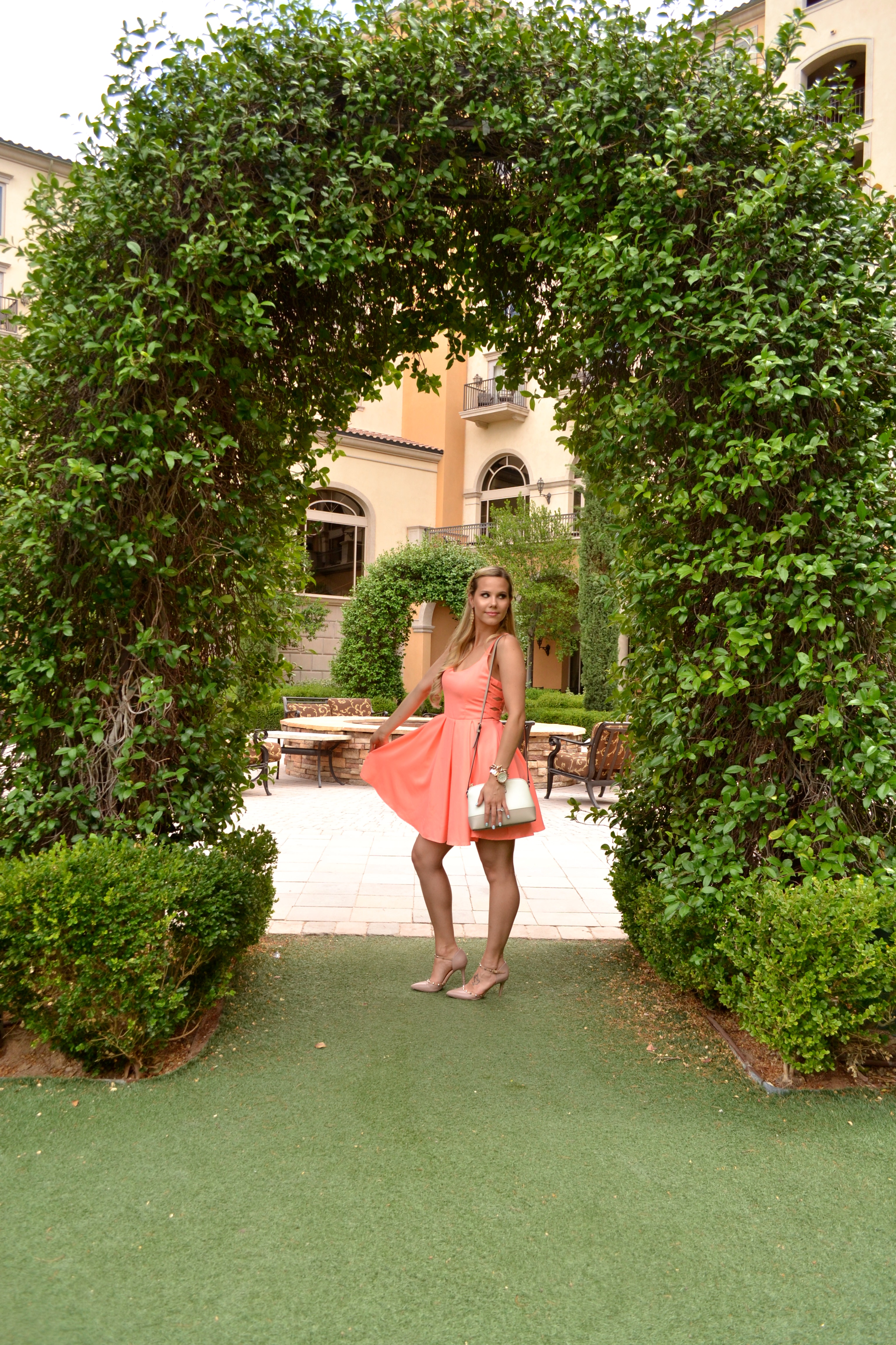 Beat the Heat with a Coral Pleated Dress