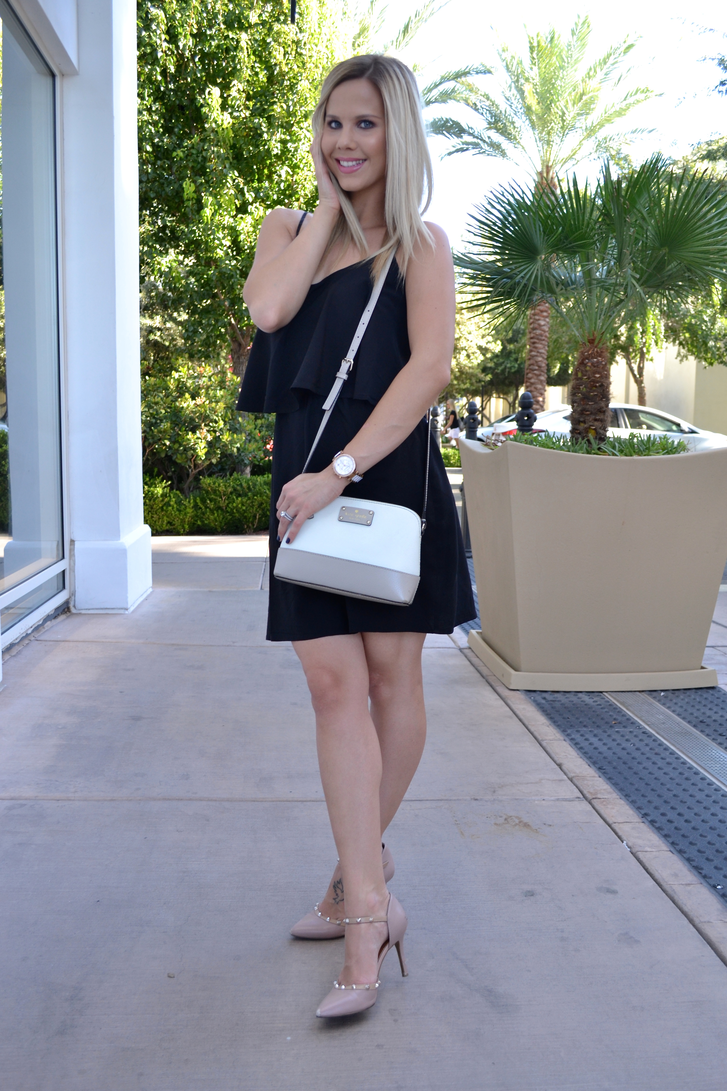 Blogger wearing Little Black Dress on glamlifeliving.com