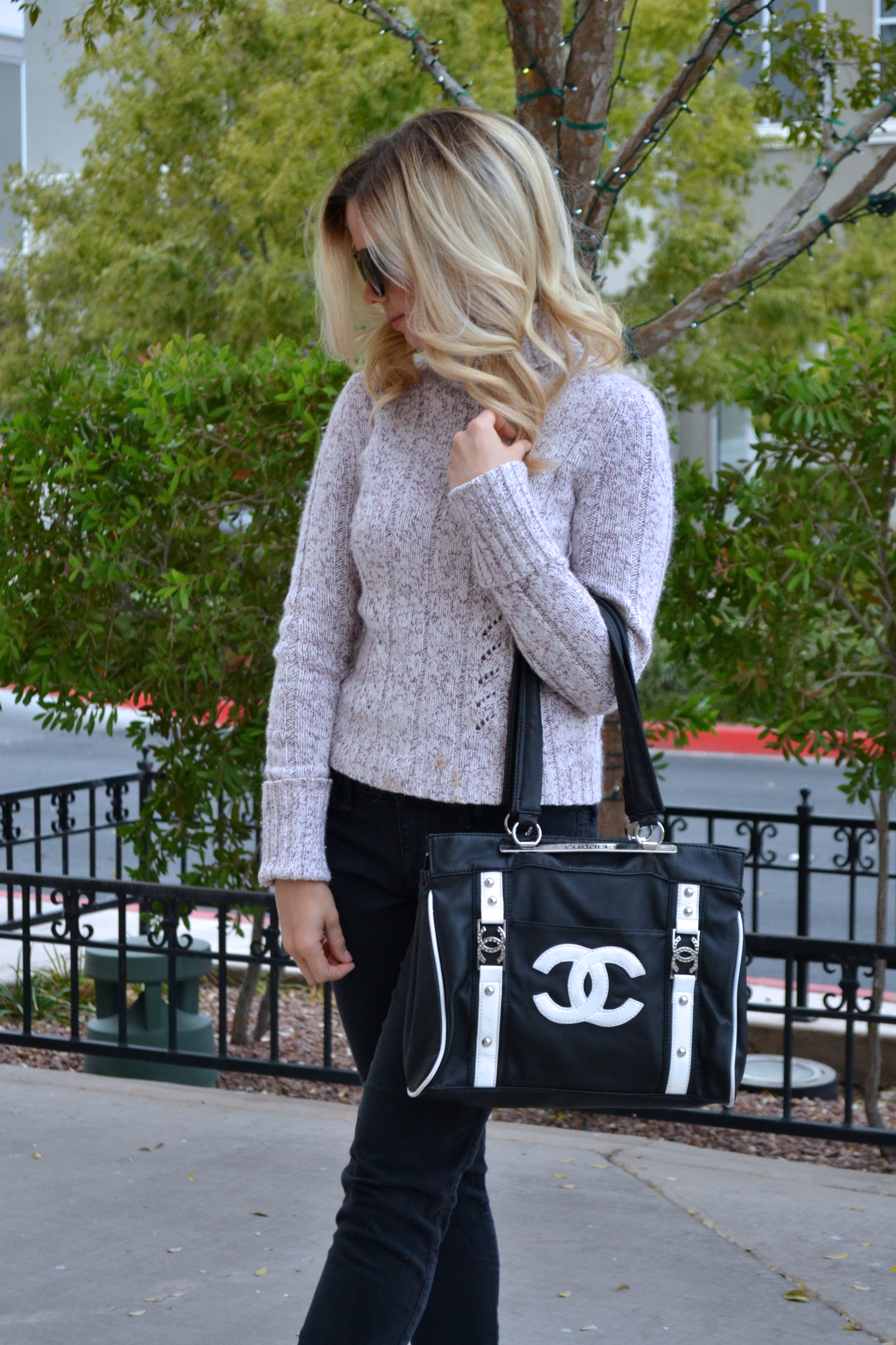 Glam Life Living in turtle neck and black jeans with vintage chanel 