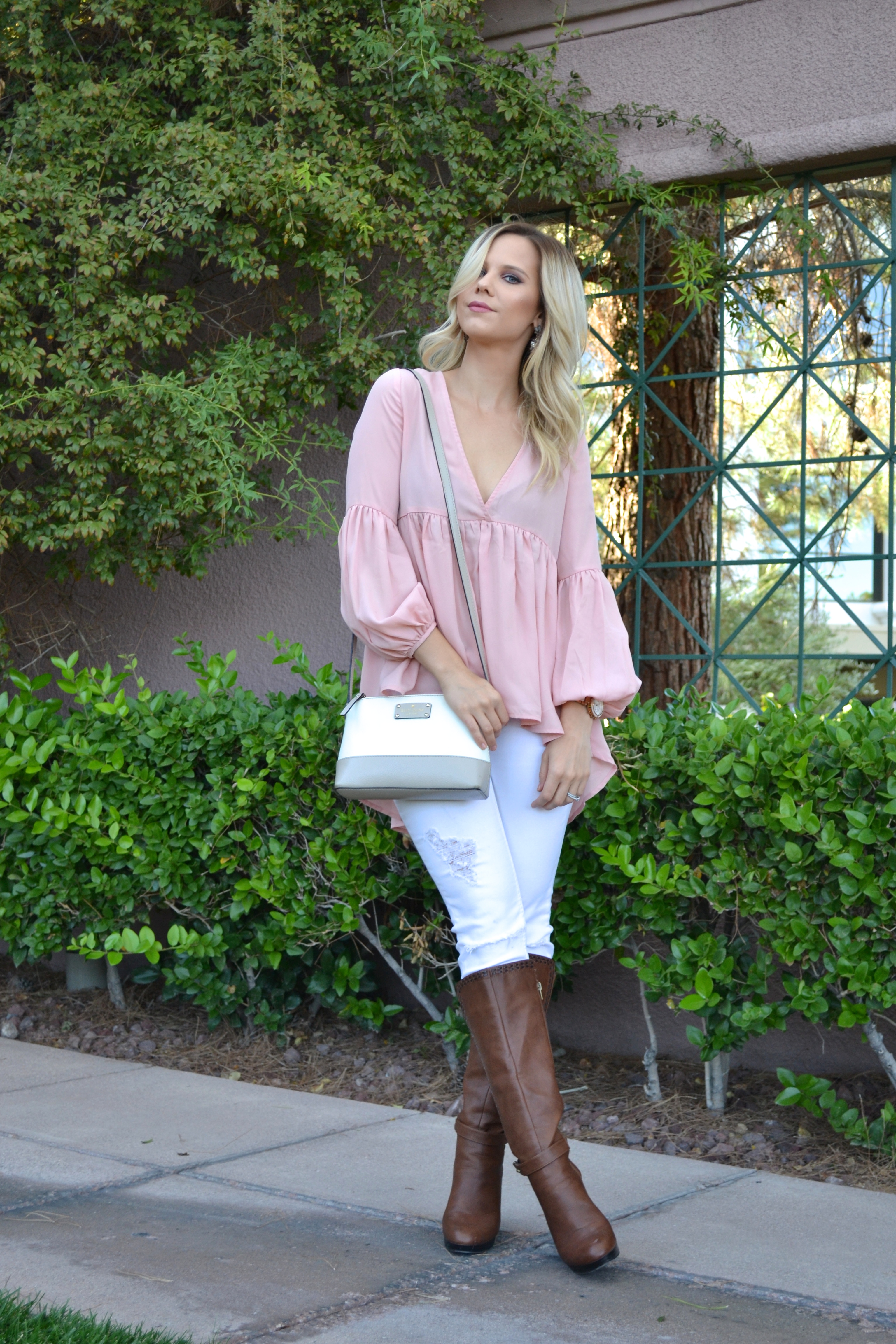 pink shirt and white jeans on the fashion blog Glam Life Living