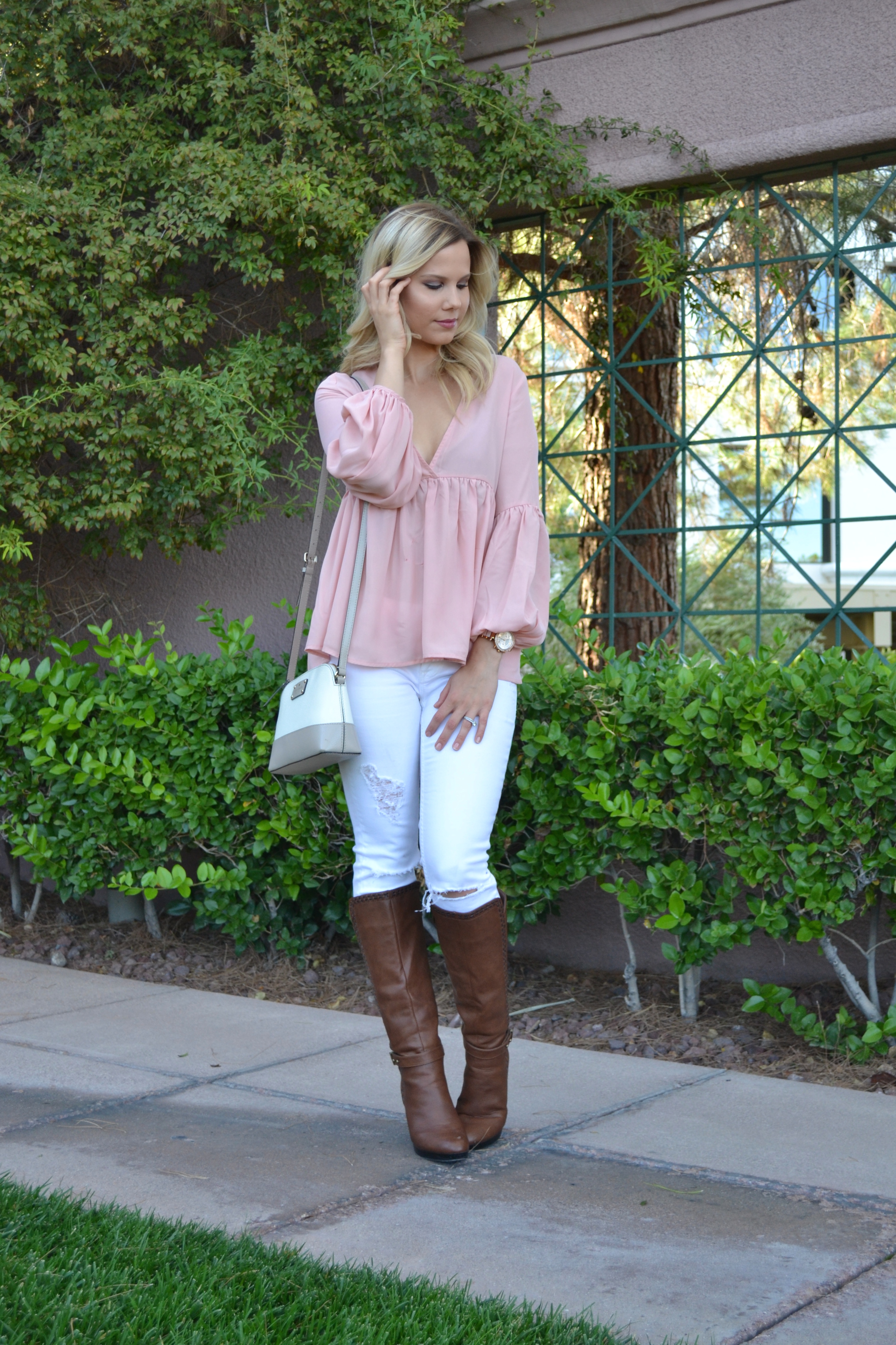 pink blouse and white jeans with Kate Spade Handbag on Glam Life Living