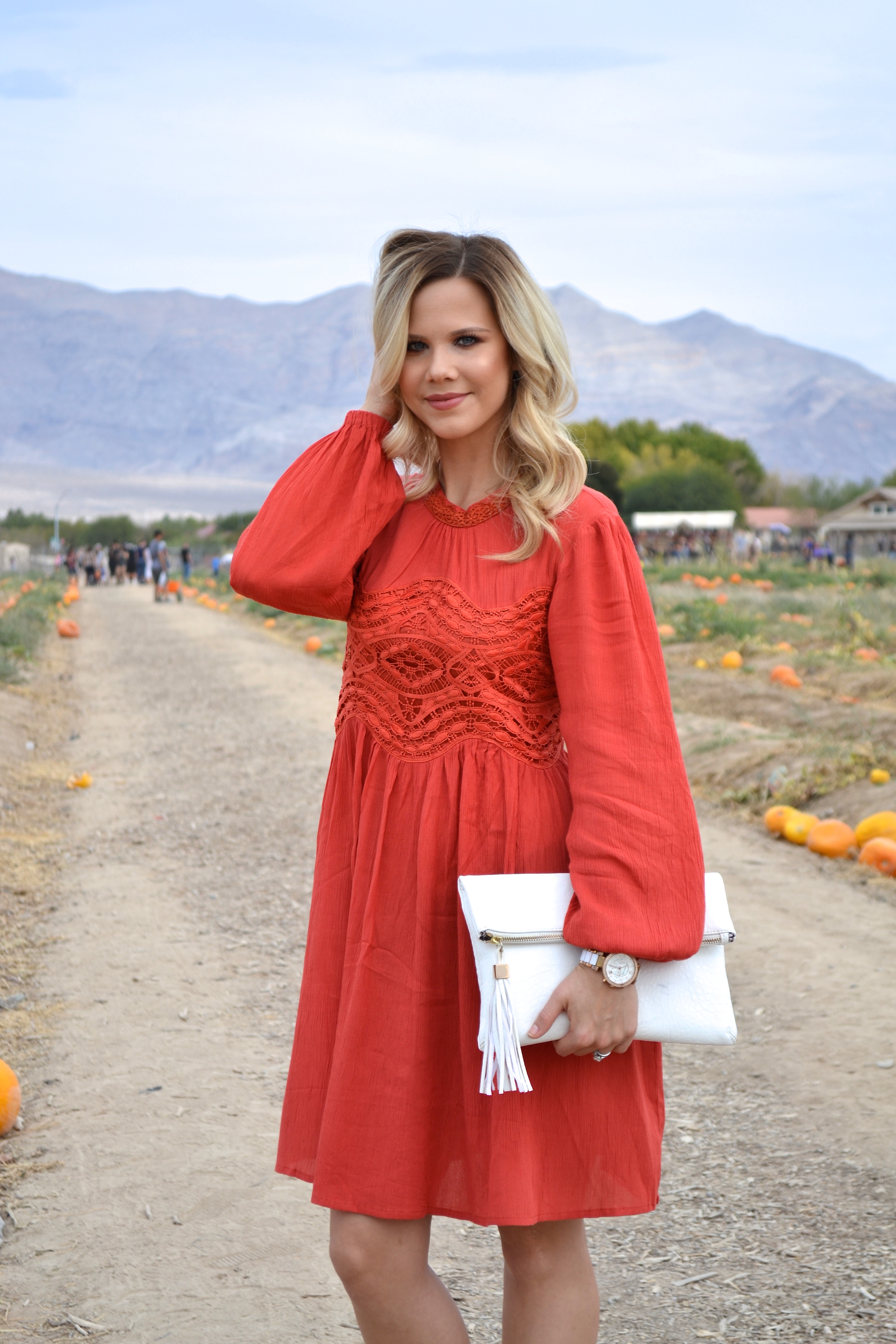 Long Sleeve Orange Dress and white clutch at Pumpkin Patch 