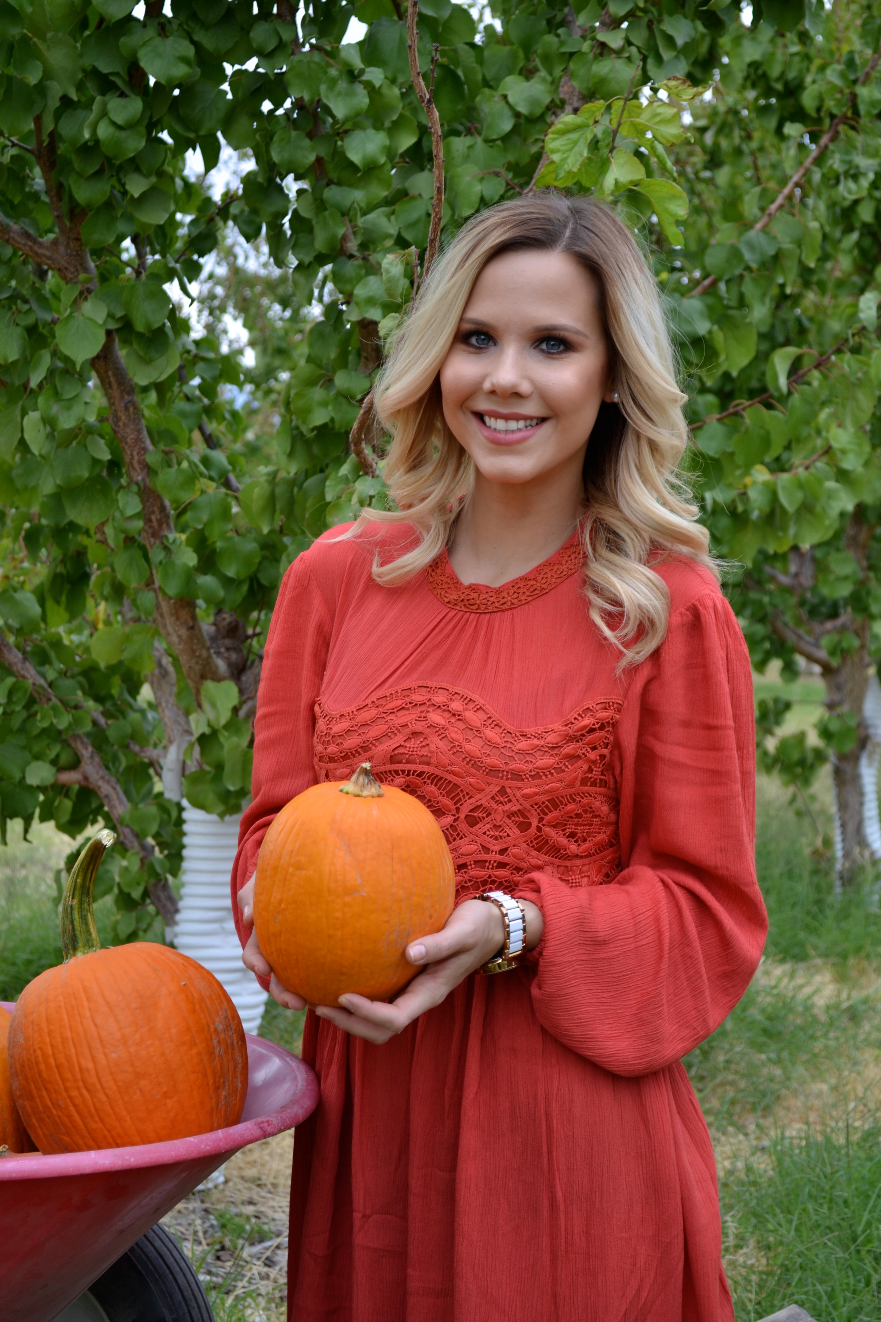 pumpkin picking in long sleeve orange lace dress on Glam Life Living 