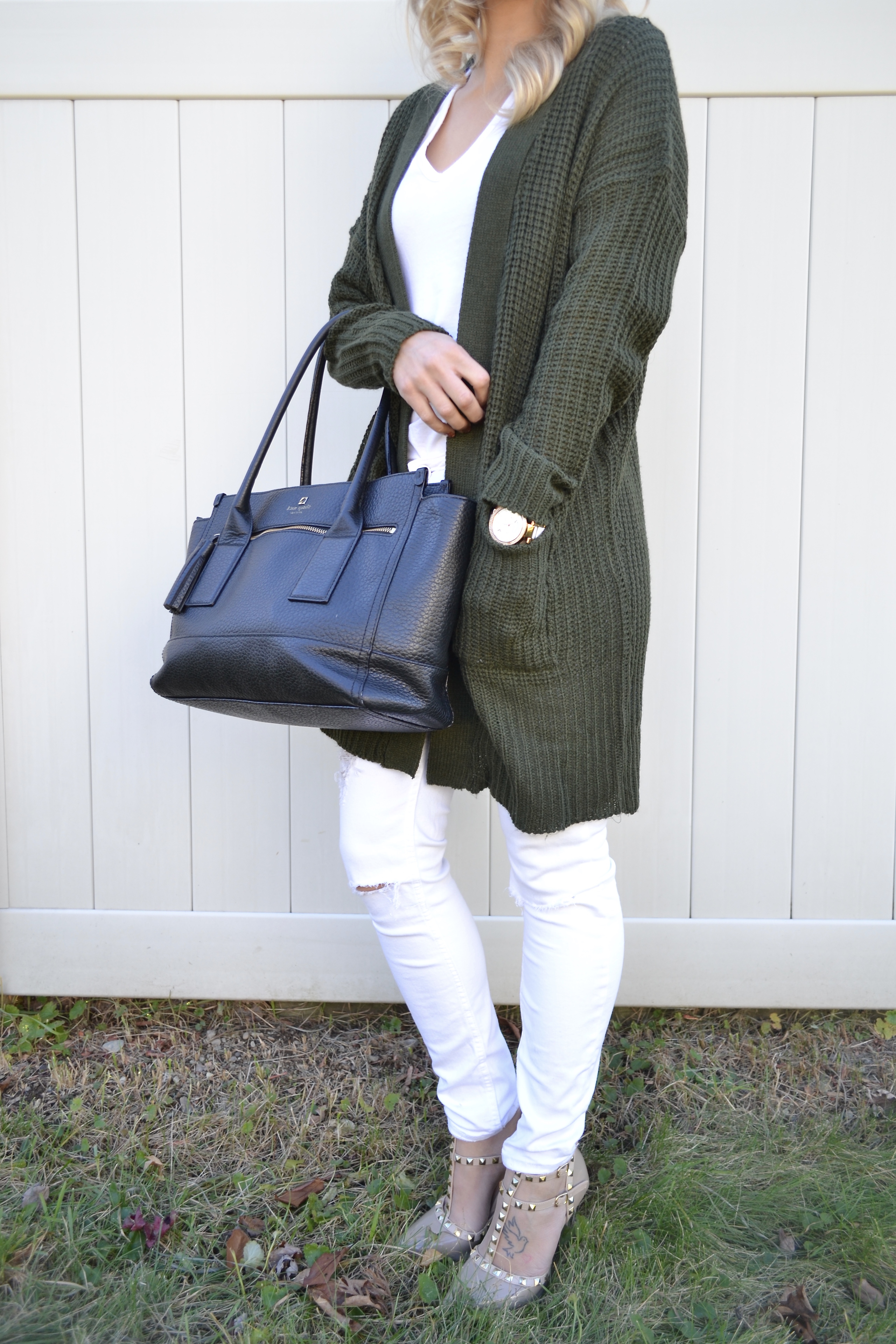 white jeans, black Kate Spade tote and Valentino dupes on Glam Life Living 