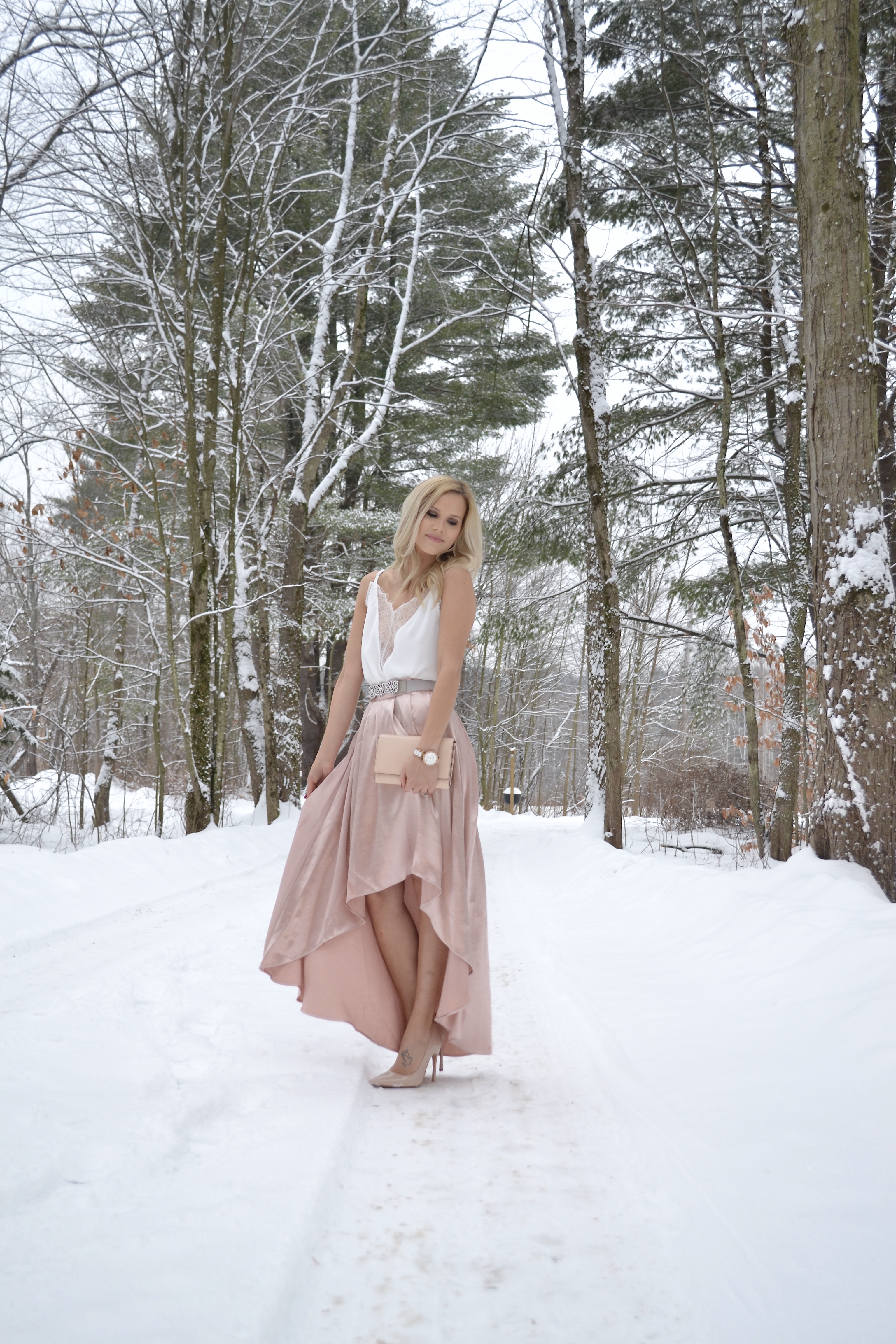 Christmas Outfit with metallic skirt, lace cami, and Tory Burch clutch