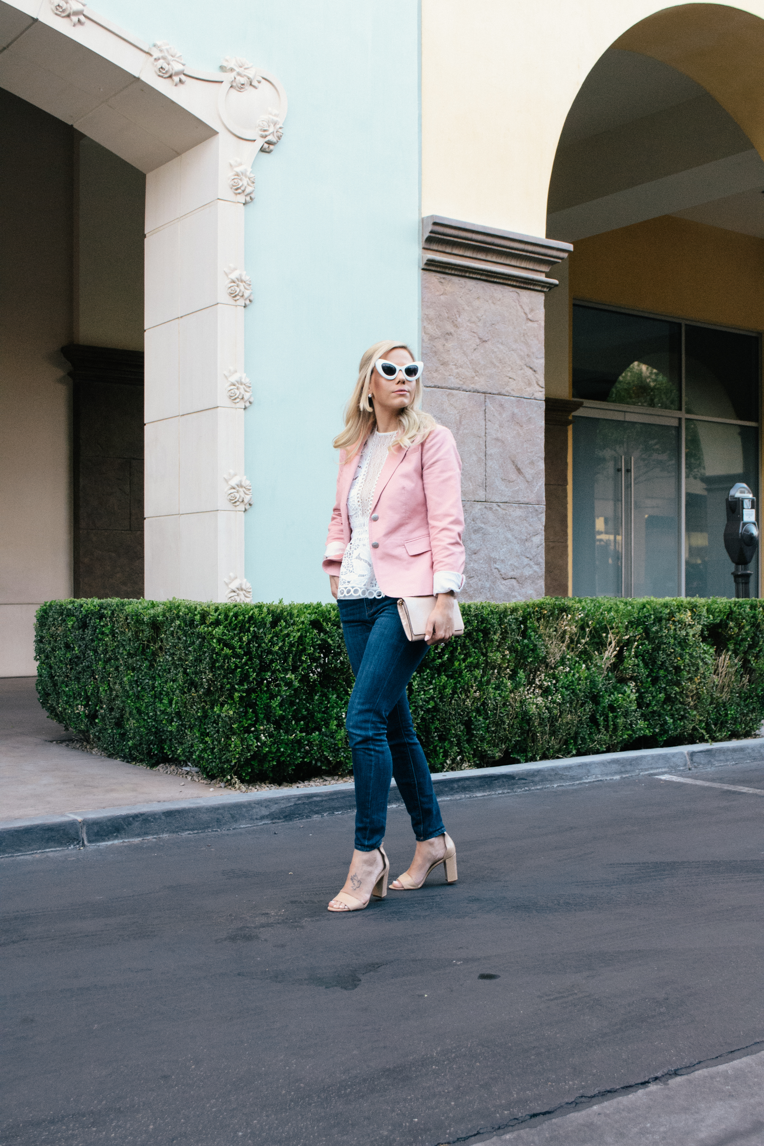 pink blazer and jeans