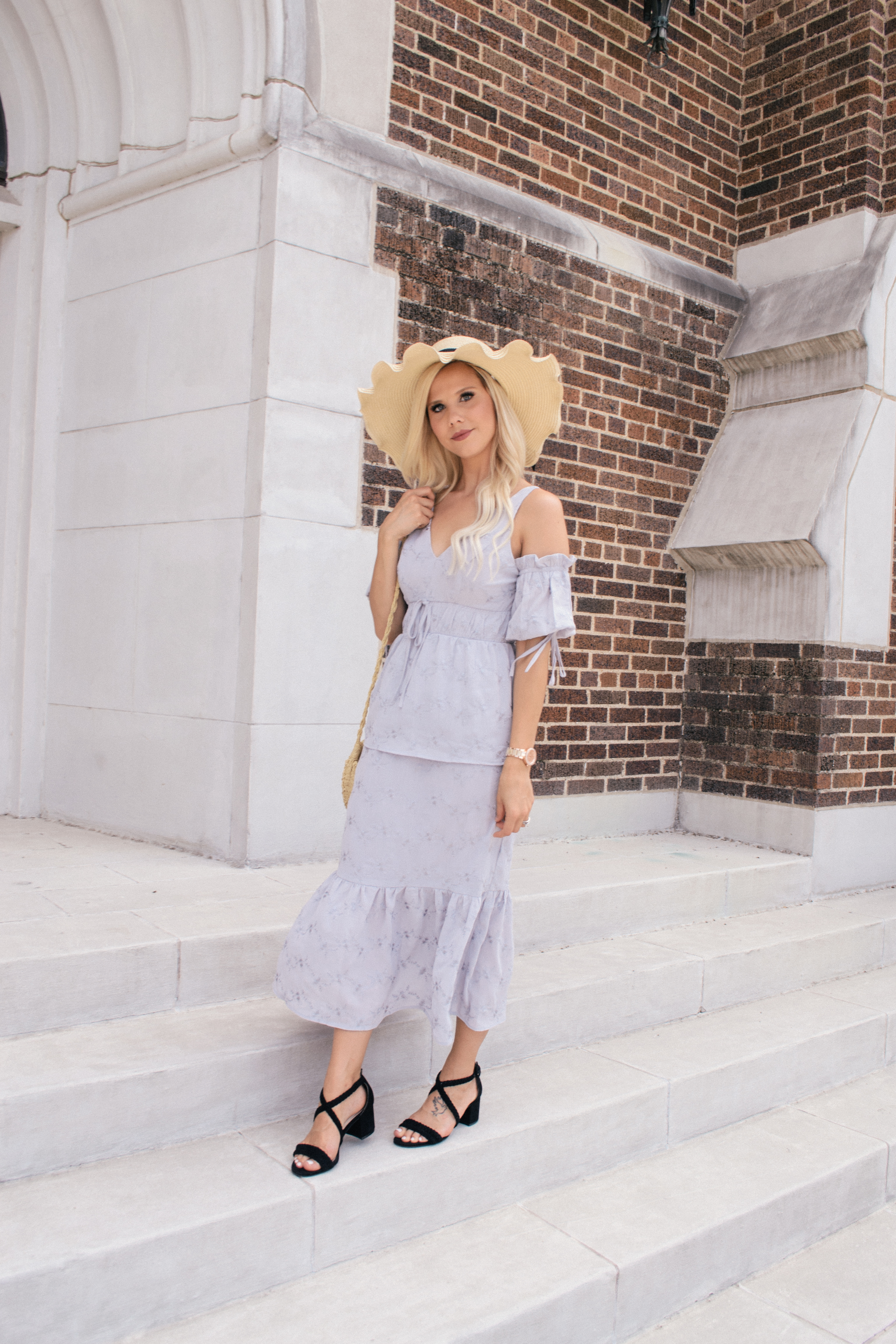 lavender grey floral midi dress with scalloped hat and straw bag