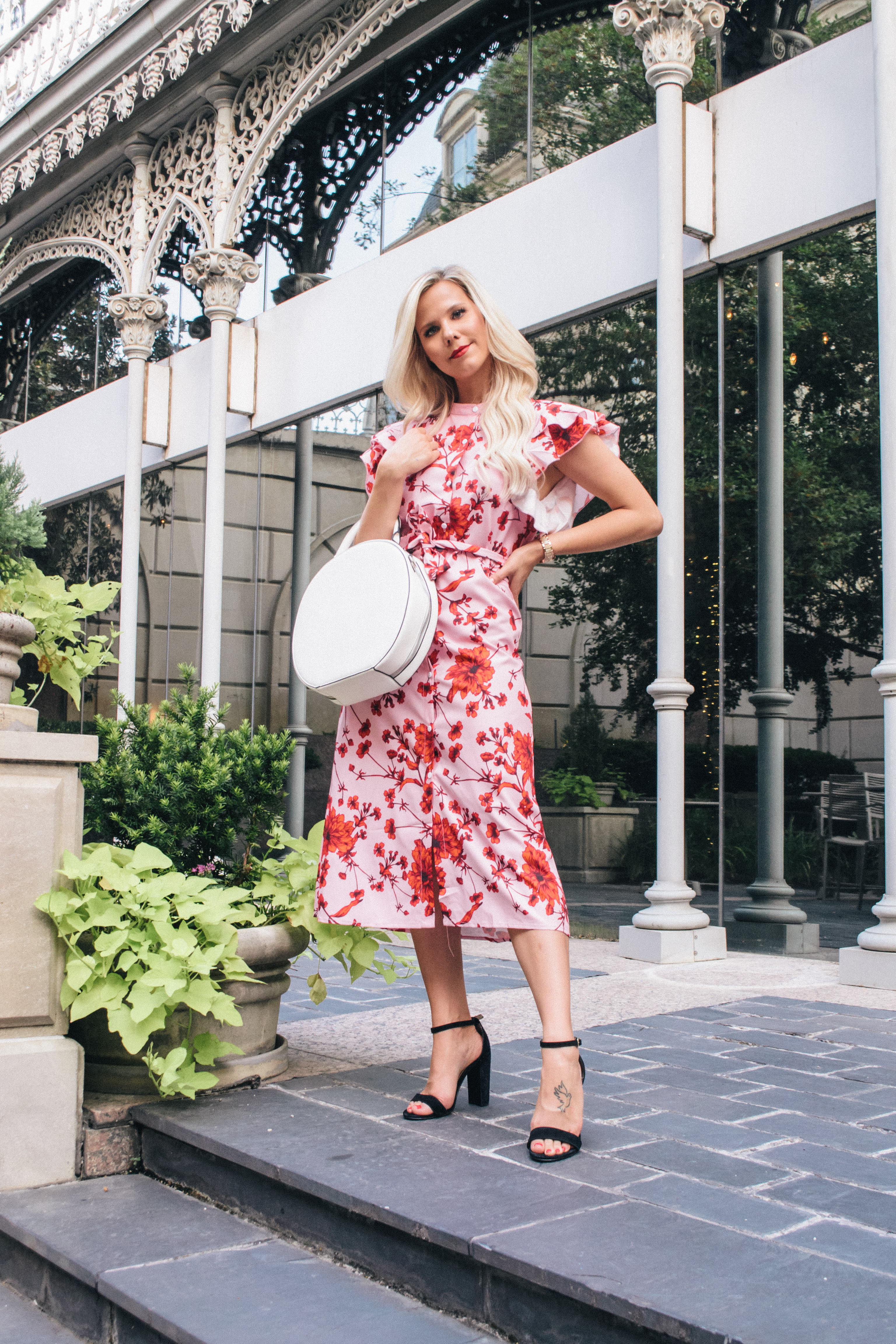 Dallas fashion blogger Hannah McDonnell of Glam Life Living in pink and red floral shirt dress