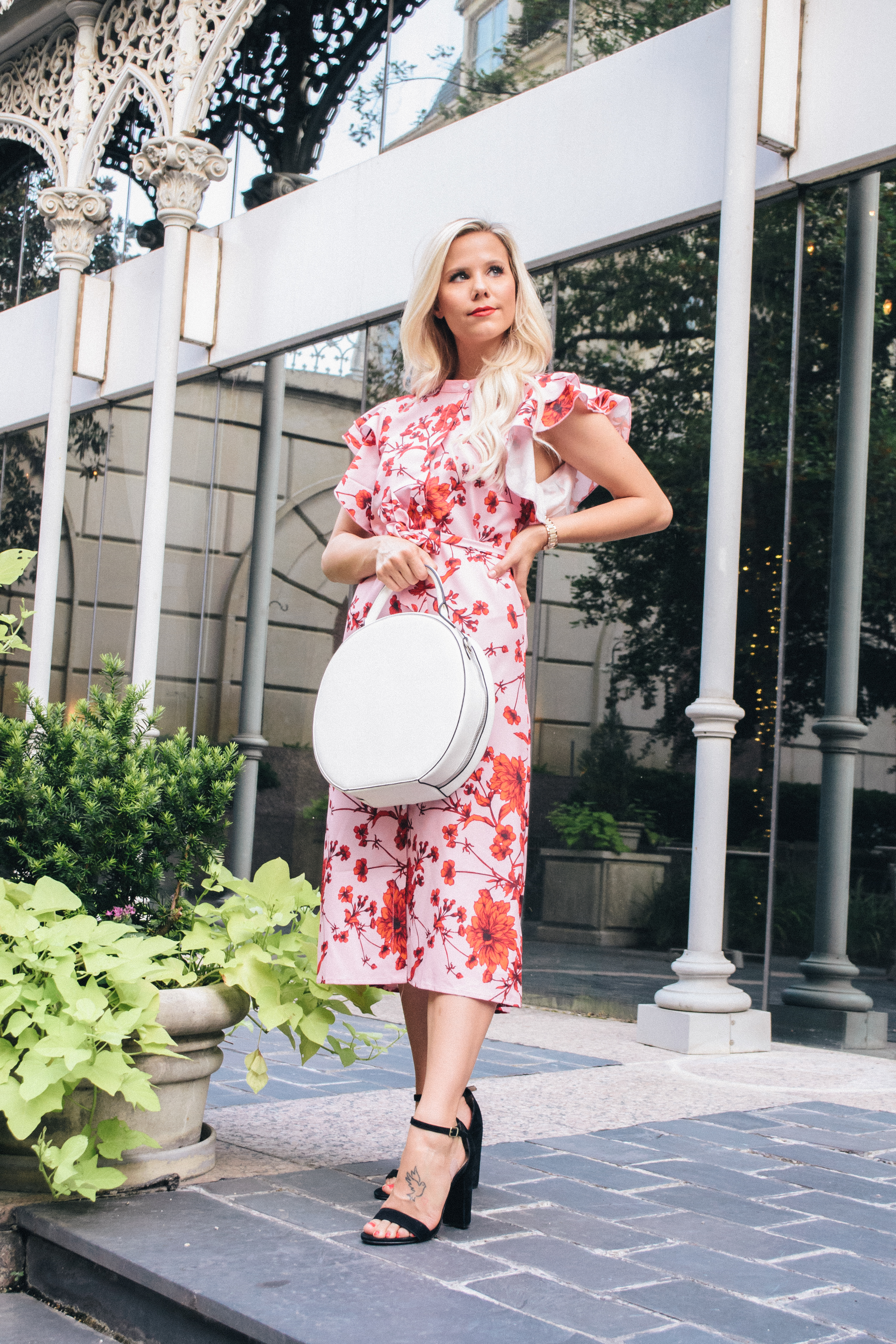 Hannah McDonnell from Glam Life Living in red and pink floral shirt dress 