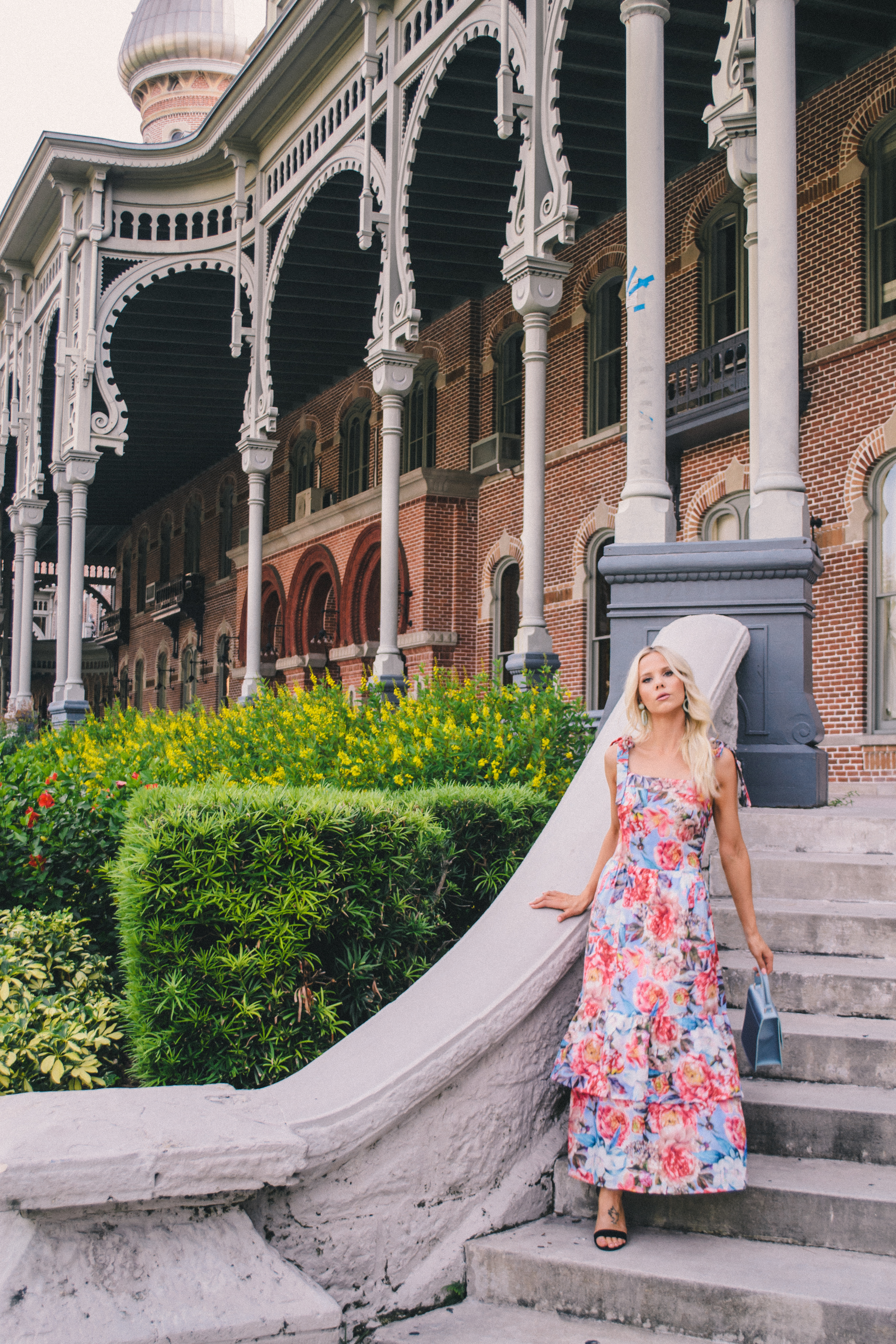 The perfect floral middi dress for a tropical destination vacation on Glam Life Living #glamlifeliving #vacationstyle #vacationoutfit 