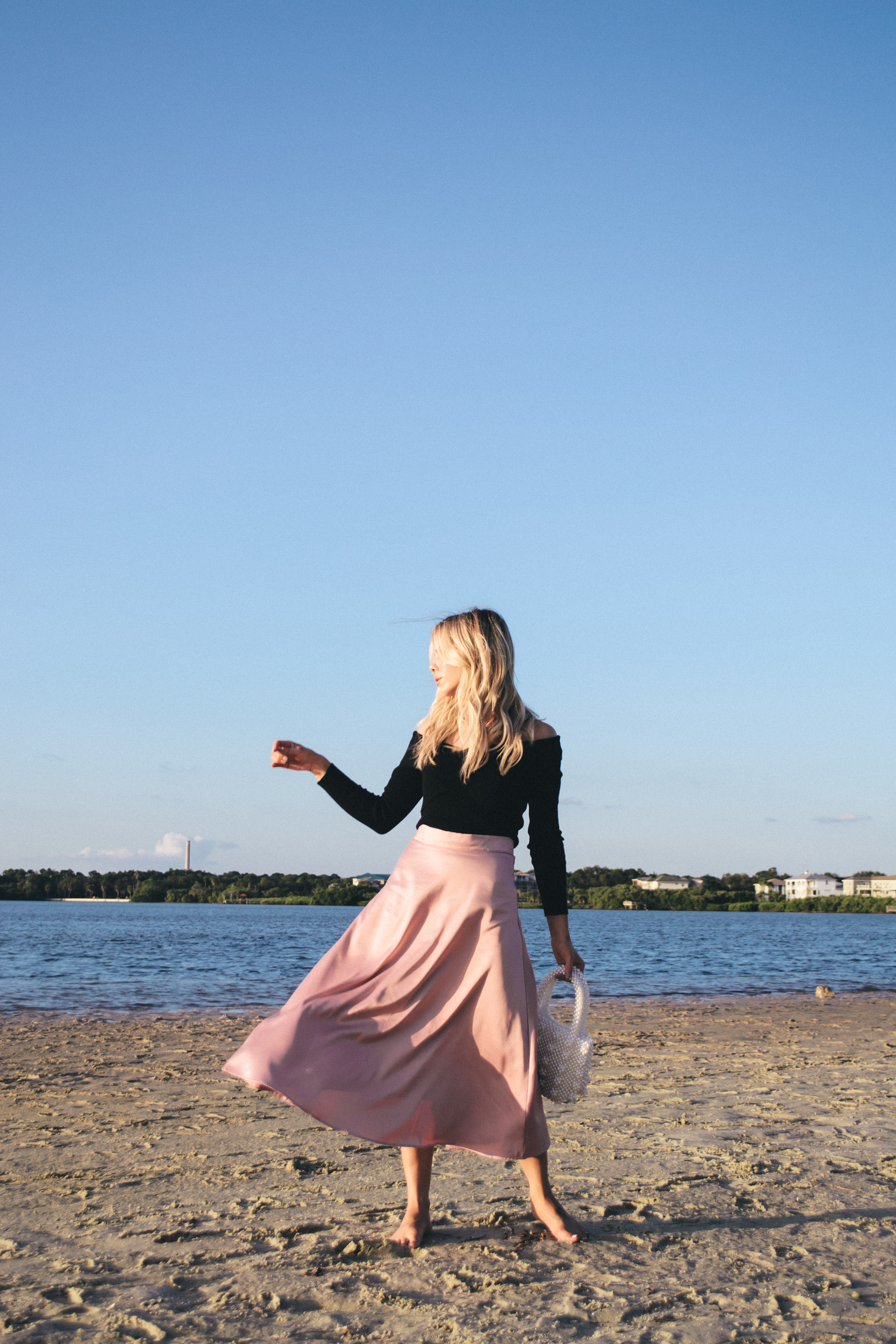 beach photoshoot, beach photos, pink satin skirt, fall outfit, beach outfit, romantic beach date night 